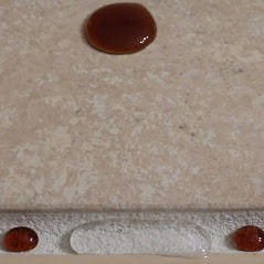 Grout being professionally sealed after a tile cleaning service by Elite Carpet Care