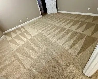 Residential bedroom carpet with clear grooming lines after professional deep cleaning by Elite Carpet Care